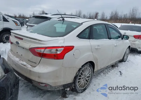 2014 Ford Focus Titanium из США, поврежденный, VIN 1FADP3J20EL193180